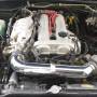 1999_mazda_miata_-_engine_bay.jpg